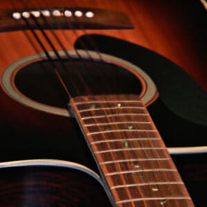 the essence of the iconic Martin D-28 guitar through an image that showcases its rich, resonant sound