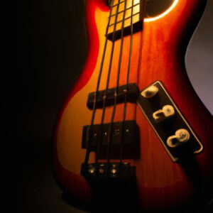 An image showcasing a vibrant, sunburst Squier Mustang Bass with a sleek rosewood fretboard, contrasting against a backdrop of a dimly lit, atmospheric music studio