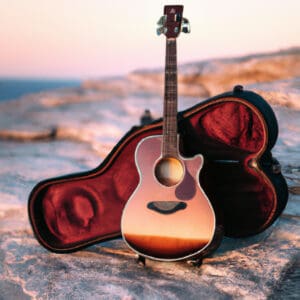 the essence of musical wanderlust with a captivating image of the Tanglewood TW2T Winterleaf Mahogany Travelsize Acoustic Guitar Bundle