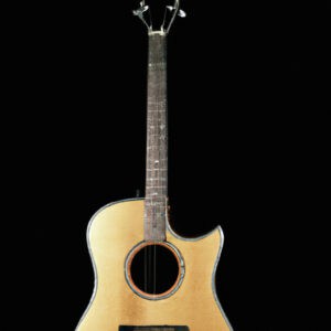 An image showcasing the exquisite craftsmanship of the Yamaha CSF3M VN: a sleek, vintage-inspired acoustic guitar with a solid Sitka spruce top, mahogany back and sides, rosewood fingerboard, and an elegant natural finish