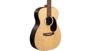 Acoustic guitar with a natural wood finish, traditional design, and steel strings suitable for music production and performances.