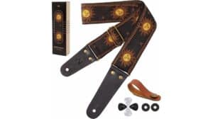 Vintage guitar strap with Sun and moon celestial design, adjustable leather ends and accessories for secure fit, ideal for music lovers and guitar enthusiasts.