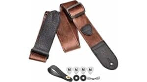 Soft leather guitar strap with adjustable brown and black design for enhanced comfort and style. Perfect for musicians seeking durable and fashionable instrument accessories.