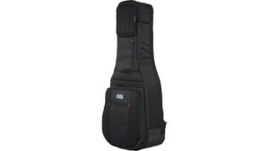 Durable black guitar travel bag with multiple compartments for accessories, designed for musicians on the go. Perfect for storing and carrying guitars securely and comfortably.