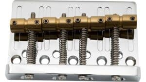 High-quality metal guitar bridge block with springs for tuning and string stability, ideal for custom guitar repairs and modifications, showcasing durable construction for superior sound quality.