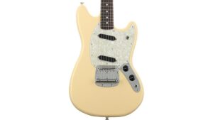 High-quality vintage electric guitar with sleek cream finish, modern electronics, and classic design. Perfect for musicians and collectors seeking superior sound and style.