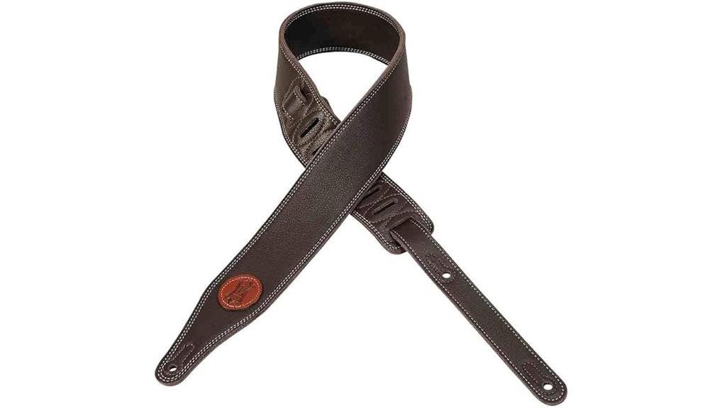 Stylish brown leather guitar strap with adjustable length and classic design, perfect for musicians and guitar enthusiasts seeking durability and comfort.