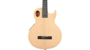 An innovative acoustic guitar featuring a distinctive soundhole shape and sleek wooden finish, perfect for musicians seeking quality sound and modern craftsmanship.